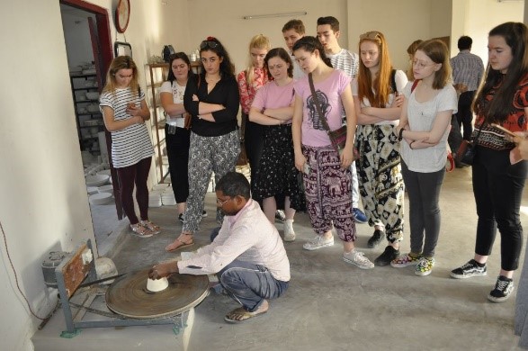 The students and the faculty were happy to see the artisans working on the potter’s wheel.